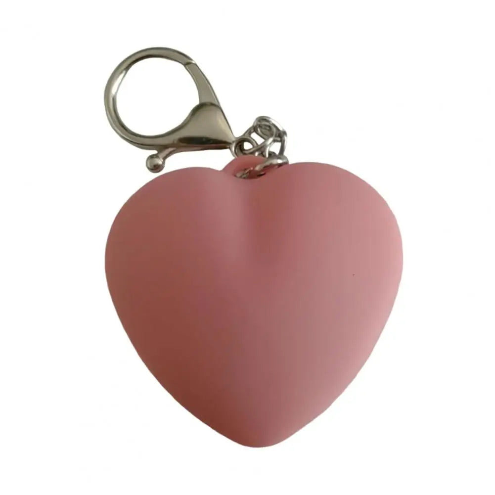 The Bag Glow — Heart-Shaped LED Purse Light That Finds Everything in the Dark 💜👜